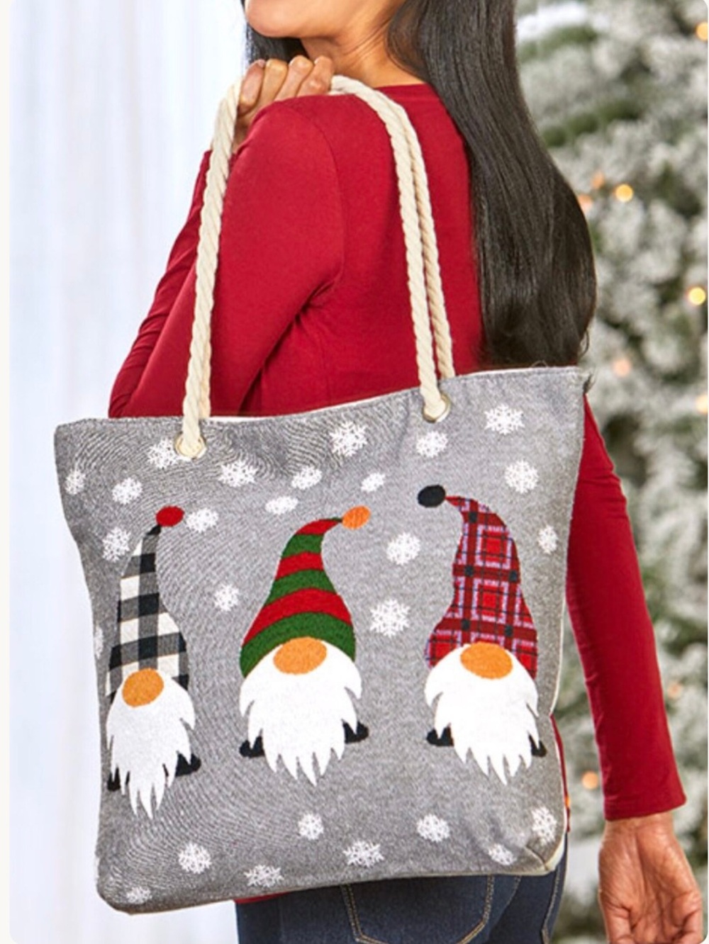 Large canvas tote featuring three holiday gnomes and snowflakes.  Rope handles.